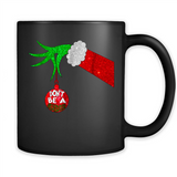 GRINCH HAND HOLDING CHRISTMAS ORNAMENT - DON'T BE A GRINCH PINGPONG